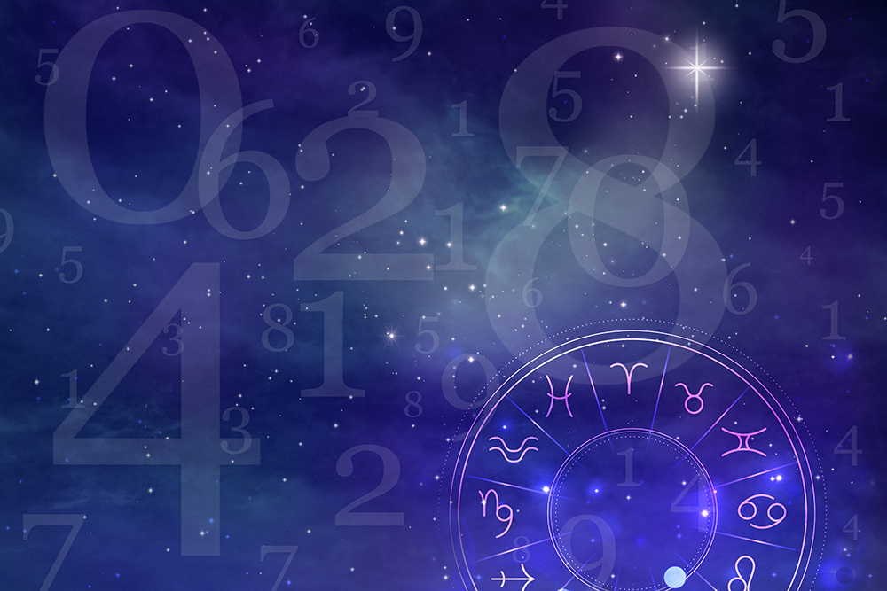 Numerology. Many numbers and zodiac wheel against sky life path number meaning