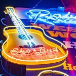 Colorful neon signs at Nashville Broadway - NASHVILLE, TENNESSEE - JUNE 15, 2019